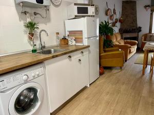 Una cocina o zona de cocina en Casa Árbol