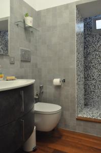 a bathroom with a toilet and a sink and a shower at ROME FOR TWO Campo de' Fiori - your home in Rome in Rome