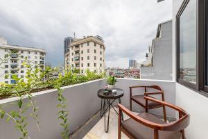Balkón nebo terasa v ubytování Classic Hotel Hanoi