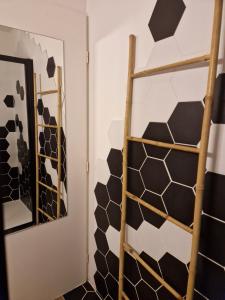 Koupelna v ubytování Sérénité au cœur de ville + 11 fotografií