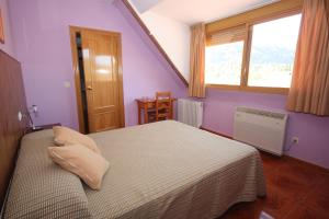 Postel nebo postele na pokoji v ubytování Hotel Rural Montaña de Cazorla