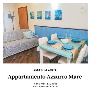 uma sala de estar com uma mesa e um sofá em Appartamento Azzurro Mare em Sestri Levante