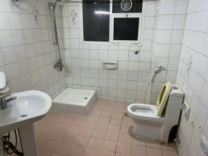 Kylpyhuone majoituspaikassa Sport Hotel
