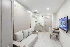 Uma TV ou centro de entretenimento em Perla Galata Hotel
