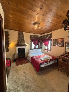 Postel nebo postele na pokoji v ubytování Πέτρινο Όραμα + 66 fotografií