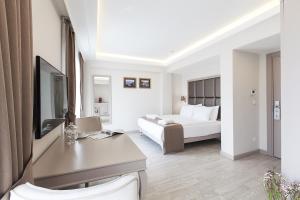 Uma TV ou centro de entretenimento em Perla Galata Hotel