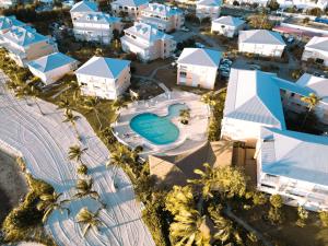 an aerial view of a resort with a swimming pool at Sun Passion Condo in Marigot
