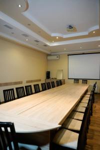 a large conference room with a large table and chairs at Hotel Monopoli Kutaisi in Kutaisi