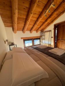 Ένα ή περισσότερα κρεβάτια σε δωμάτιο στο Agriturismo del Cimone