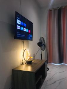 TV a/nebo společenská místnost v ubytování KaMageba Palace