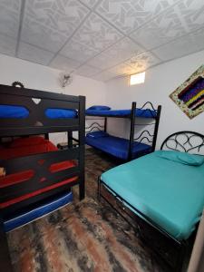 Krevet ili kreveti na kat u jedinici u objektu Casa La Pajarita
