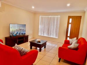 A seating area at 112 Anna Drive,Raceview,QLD 4305