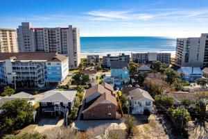 an aerial view of a city with buildings and the ocean at 1408 Perrin Dr, Unit A - Ocean Walk Sleeps 8 in Myrtle Beach