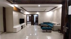 a living room with a couch and a tv at City Beautiful Home Double Room Suite in Panchkula