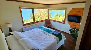 Cama o camas de una habitación en Hermosa Casa en Valdivia