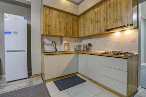 Kitchen o kitchenette sa «Casamia» апартаменты с 2 спальнями