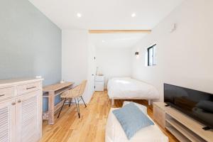TV a/nebo společenská místnost v ubytování Innocence Resort -in Chiba Resol-