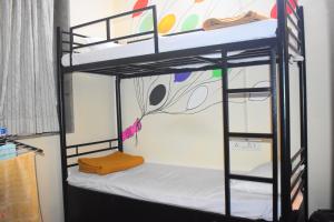 Postel nebo postele na pokoji v ubytování Solo Hostel