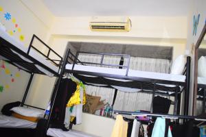 Postel nebo postele na pokoji v ubytování Solo Hostel