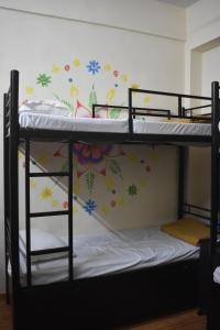 Postel nebo postele na pokoji v ubytování Solo Hostel