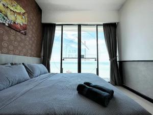 Postel nebo postele na pokoji v ubytování PD 4 Bedrooms Duplex - Full Seaview (Up to 16 Pax)