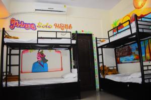 Postel nebo postele na pokoji v ubytování Solo Hostel