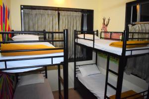 Postel nebo postele na pokoji v ubytování Solo Hostel