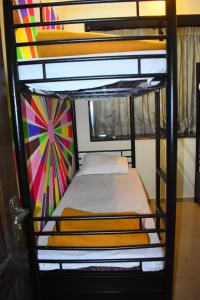 Postel nebo postele na pokoji v ubytování Solo Hostel