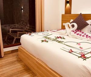 Postel nebo postele na pokoji v ubytování Kihaa Holiday Home