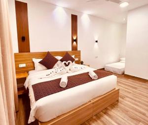 Postel nebo postele na pokoji v ubytování Kihaa Holiday Home
