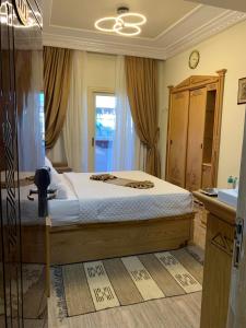A bed or beds in a room at Teba Hotel Ras Elbar
