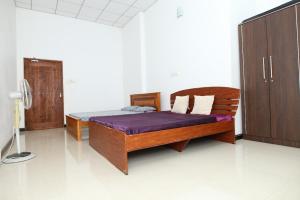 Giường trong phòng chung tại Sujee's Guest House with Two Bed Rooms