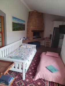 Ένα ή περισσότερα κρεβάτια σε δωμάτιο στο Worcester Garden Cottage