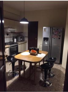 Kuchyň nebo kuchyňský kout v ubytování Cómoda Suite + piscina