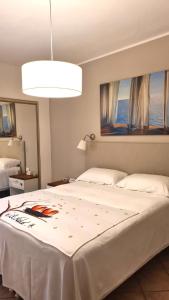Posteľ alebo postele v izbe v ubytovaní Il Nido B&B