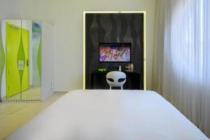 TV a/nebo společenská místnost v ubytování Poli House by AFI Hotels