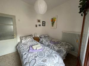Postel nebo postele na pokoji v ubytování Rustico in Storo + 11 fotografií