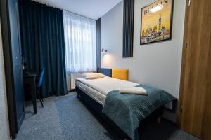 Posteľ alebo postele v izbe v ubytovaní Elegant Apartments