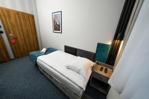 Posteľ alebo postele v izbe v ubytovaní Elegant Apartments