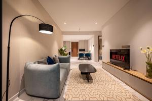 Posezení v ubytování Metropole Thu Thiem Condo Apartment