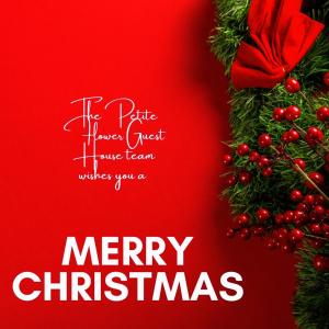 a christmas card with a christmas tree at Petite Flower Guest House in Talata-maty