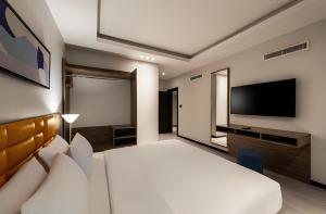 TV o dispositivi per l'intrattenimento presso HDB Al Khobar Resort & Spa