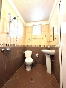 Koupelna v ubytování Guest House Meraklii