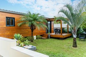 Zahrada ubytování Bungalow L'escale de Takamaka