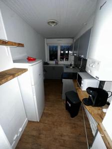 Kuchyň nebo kuchyňský kout v ubytování Appartement 2 chambres lumineux à 10 minutes de Paris