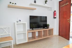 Telewizja i/lub zestaw kina domowego w obiekcie Apartamento El Sendero