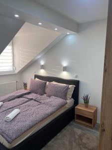 Postel nebo postele na pokoji v ubytování Guest House LILA