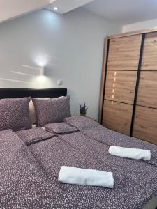 Postel nebo postele na pokoji v ubytování Guest House LILA