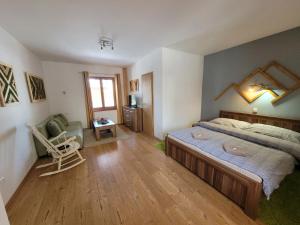 Postel nebo postele na pokoji v ubytování Family House - Apartmany Zuzana