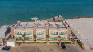 an aerial view of a building next to the beach at Dakhla South Bay in Dakhla